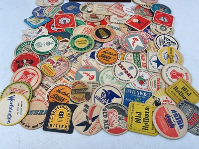 Lot 23 - A large collection of vintage beer mats,...