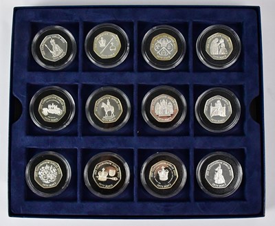 Lot 611 - Twelve silver proof 50p coins, 'The Royal Mint...