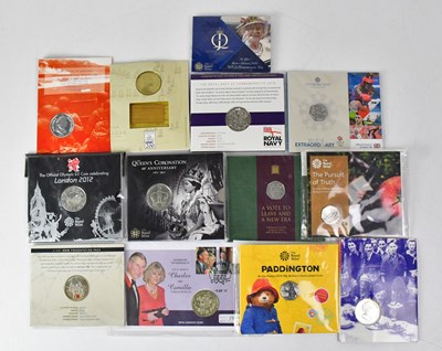 Lot 610 - A collection of thirteen commemorative coins,...