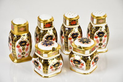 Lot 1612 - ROYAL CROWN DERBY; a six piece cruet in the...