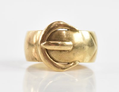 Lot 90 - A substantial 9ct yellow gold buckle ring,...
