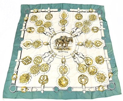 Lot 761 - HERMÈS; a 100% silk green, cream and gold...