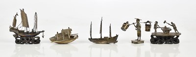 Lot 1284 - Two Chinese white metal models of Junks, on...