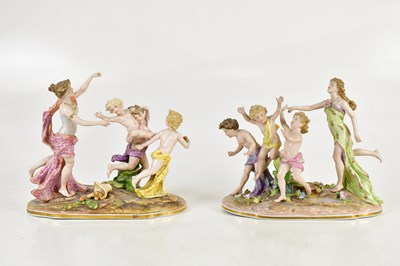 Lot 1475 - A pair of Continental porcelain figure groups...