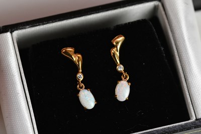 Lot 301 - A pair of yellow metal diamond and opal set...