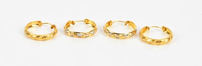 Lot 295 - Two pairs of yellow metal hoop earrings with...