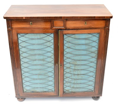Lot 2722 - A Regency rosewood cabinet with two drawers...