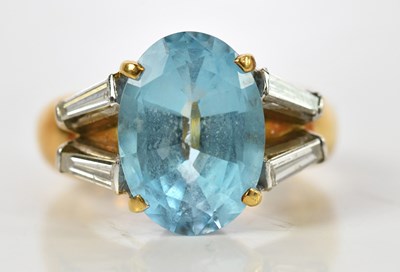 Lot 65 - An 18ct yellow gold blue topaz and diamond set...