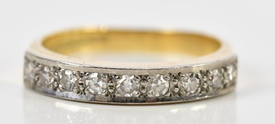 Lot 114 - An 18ct yellow gold nine stone diamond half...