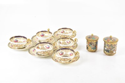 Lot 1515 - CAULDON; six teacups and saucers with floral...