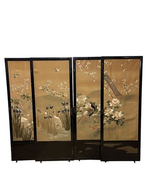 Lot 1346 - Four Japanese black lacquered and silk screens,...