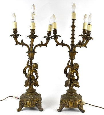 Lot 1290 - A pair of Victorian gilt metal four branch...