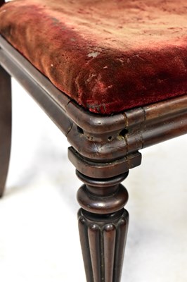 Lot 48 - Seven George III mahogany bar-back dining...