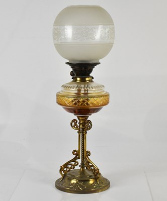 Lot 1299 - An early 20th century oil lamp with cut glass...