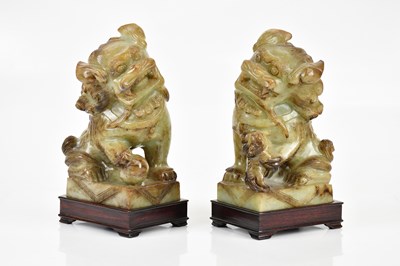 Lot 49 - A pair of Chinese hardstone rampant Dogs of Fo,...