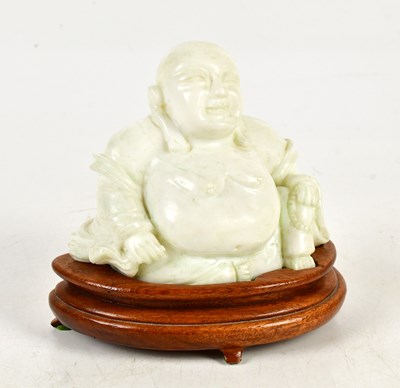 Lot 550 - A Chinese hardstone carving of Buddha and...