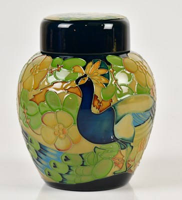Lot 1423 - MOORCROFT; a ginger jar and cover, decorated...