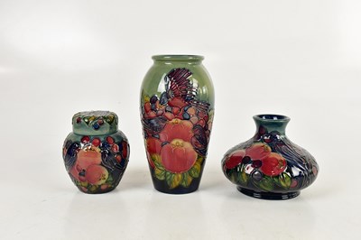 Lot 1427 - SALLY TUFFIN FOR MOORCROFT; three pieces...