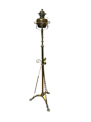 Lot 1301 - A Victorian brass adjustable oil lamp, with...