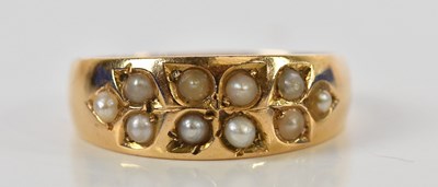 Lot 189 - A 15ct yellow gold seed pearl set ring in leaf...