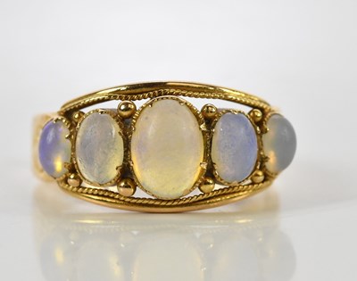Lot 128 - A 15ct yellow gold five stone graduated opal...