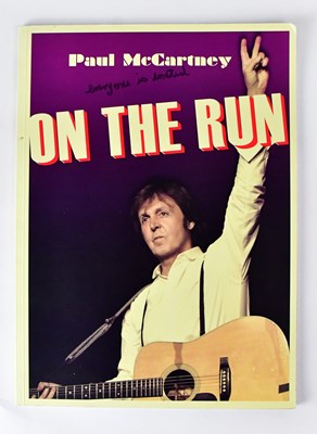 Lot 419 - PAUL MCCARTNEY; an 'On The Run' tour programme,...