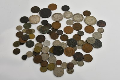 Lot 646 - A small collection of assorted coins including...
