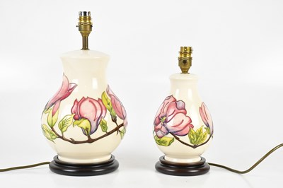 Lot 1578 - MOORCROFT; two 'Magnolia' pattern lamps, each...