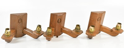 Lot 1297 - ALAN GRAINGER ‘ACORN MAN’; three carved oak...