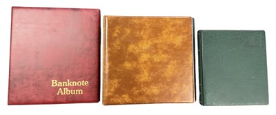 Lot 1564 - An album of all world coinage including francs,...
