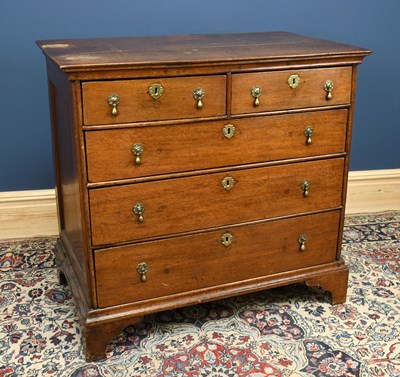 Lot 2952 - An 18th century oak chest of two short over...