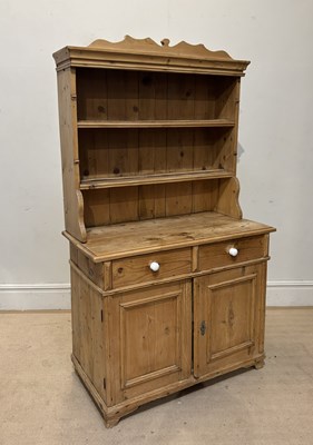 Lot 1146 - A pine country kitchen dresser, with shelves...