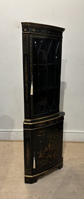 Lot 1184 - A George II style Chinoiserie corner cabinet,...
