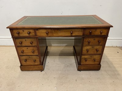 Lot 1148 - An Edwardian mahogany pedestal desk, with an...
