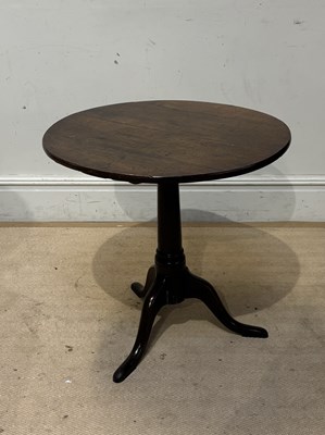 Lot 1045 - A George III oak tripod table, with circular...