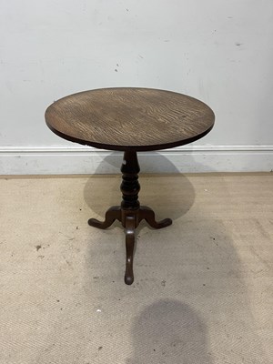 Lot 1046 - A George III oak tripod table, with circular...