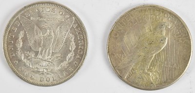 Lot 1581 - Two USA dollars including a 1925 peace dollar...