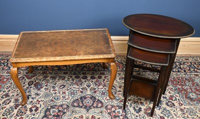 Lot 3072 - A mahogany nest of three coffee tables, height...