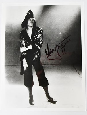 Lot 430 - MICK JAGGER; a signed black and white...