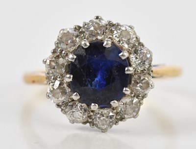 Lot 46 - A yellow metal sapphire and diamond cluster...