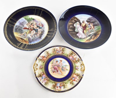 Lot 1587 - VIENNA; a large pair of ceramic wall chargers...