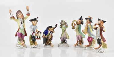 Lot 1470 - A Continental porcelain seven piece monkey...