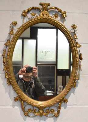 Lot 73 - An early 20th century elaborate floral gilt...
