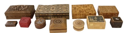 Lot 343 - A collection of ten assorted carved wooden...