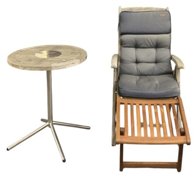 Lot 116 - ALEXANDER ROSE; a modern circular garden table,...