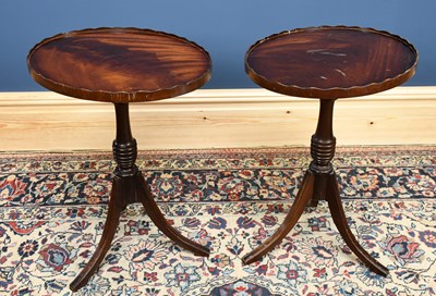 Lot 3068 - A pair of reproduction mahogany tripod coffee...