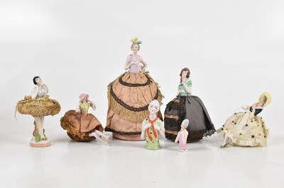 Lot 1491 - Seven assorted pin cushion dolls (7).