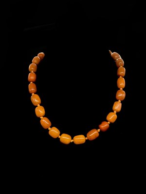 Lot 1302 - A vintage hand tied string of egg...
