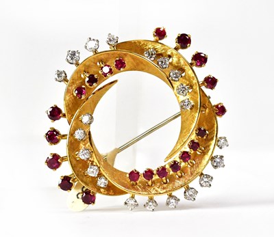 Lot 837 - GARRARD; an 18ct yellow gold circular brooch...