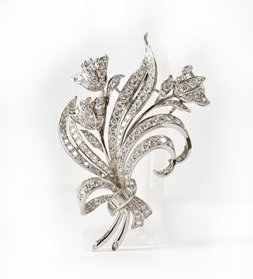 Lot 845 - A white metal brooch in the form of a bouquet...